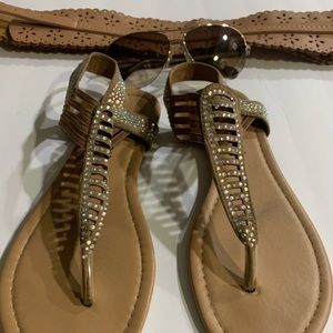 Belt, sunglasses and sandals